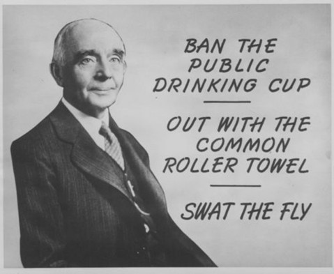 Dr. Crumbine alongside the slogans of some of his public health campaigns, circa 1904-1924. (Kansas Historical Society)