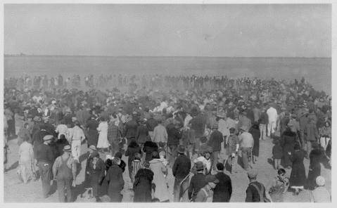 A group of people gathered for a rabbit drive in Gray County, c. 1934. (Kansas Historical Society)